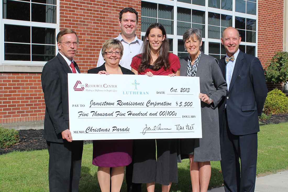 Check presentation for the 2013 Christmas Parade and Holiday Celebration in downtown Jamestown.